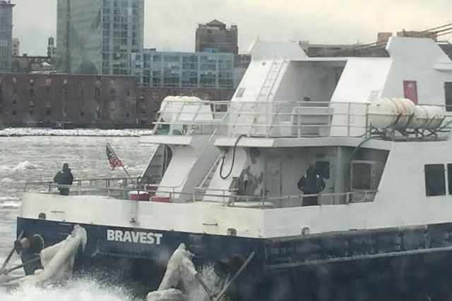 A photo of the boat that came to break ice and free the East River Ferry this morning.